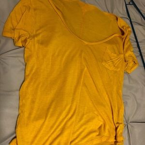 Yellow wide neck shirt